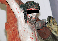 Jesus blutig am Kreuz